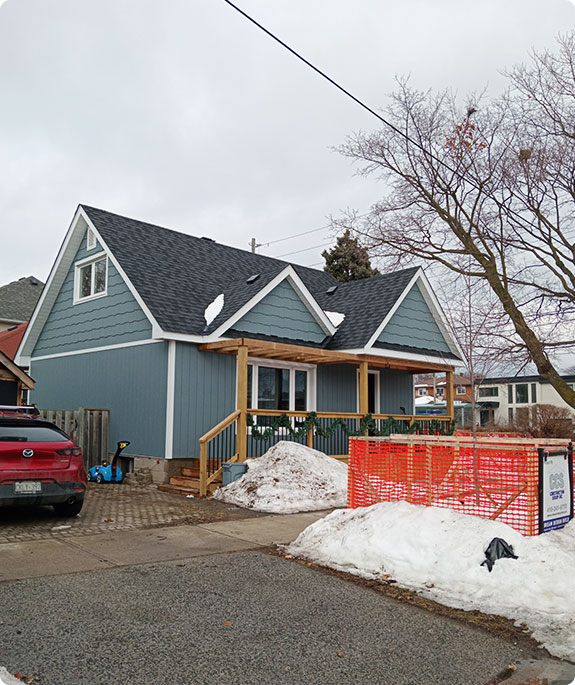Close-up view of roof shingles under inspection