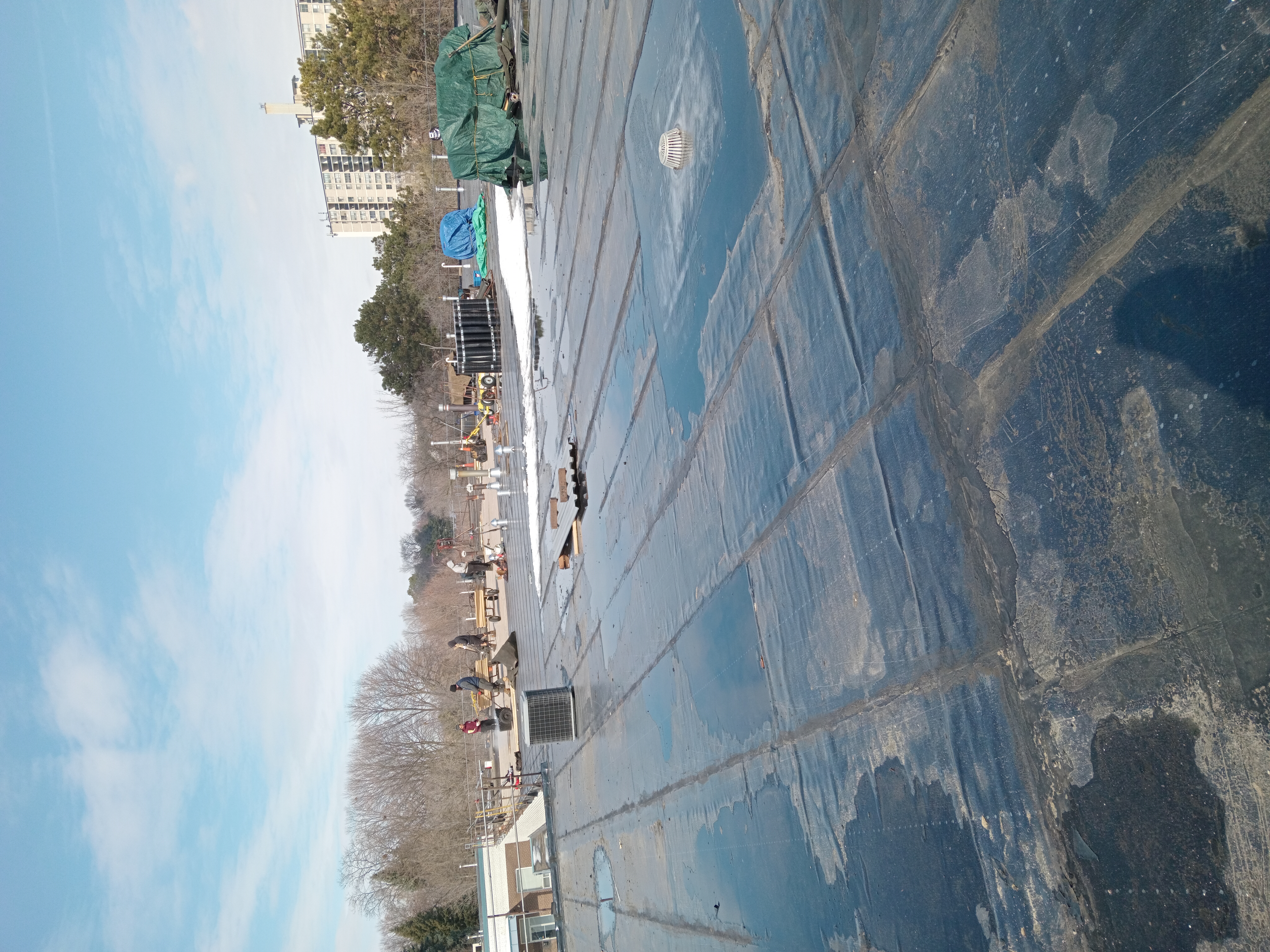 Roof with visible damage requiring professional inspection